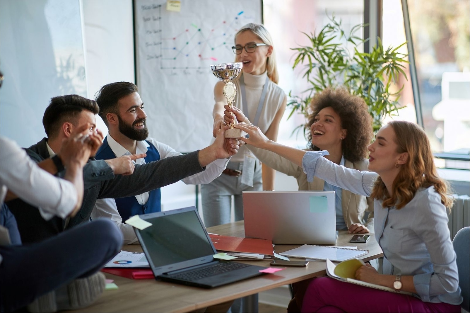 Employees celebrating with awards